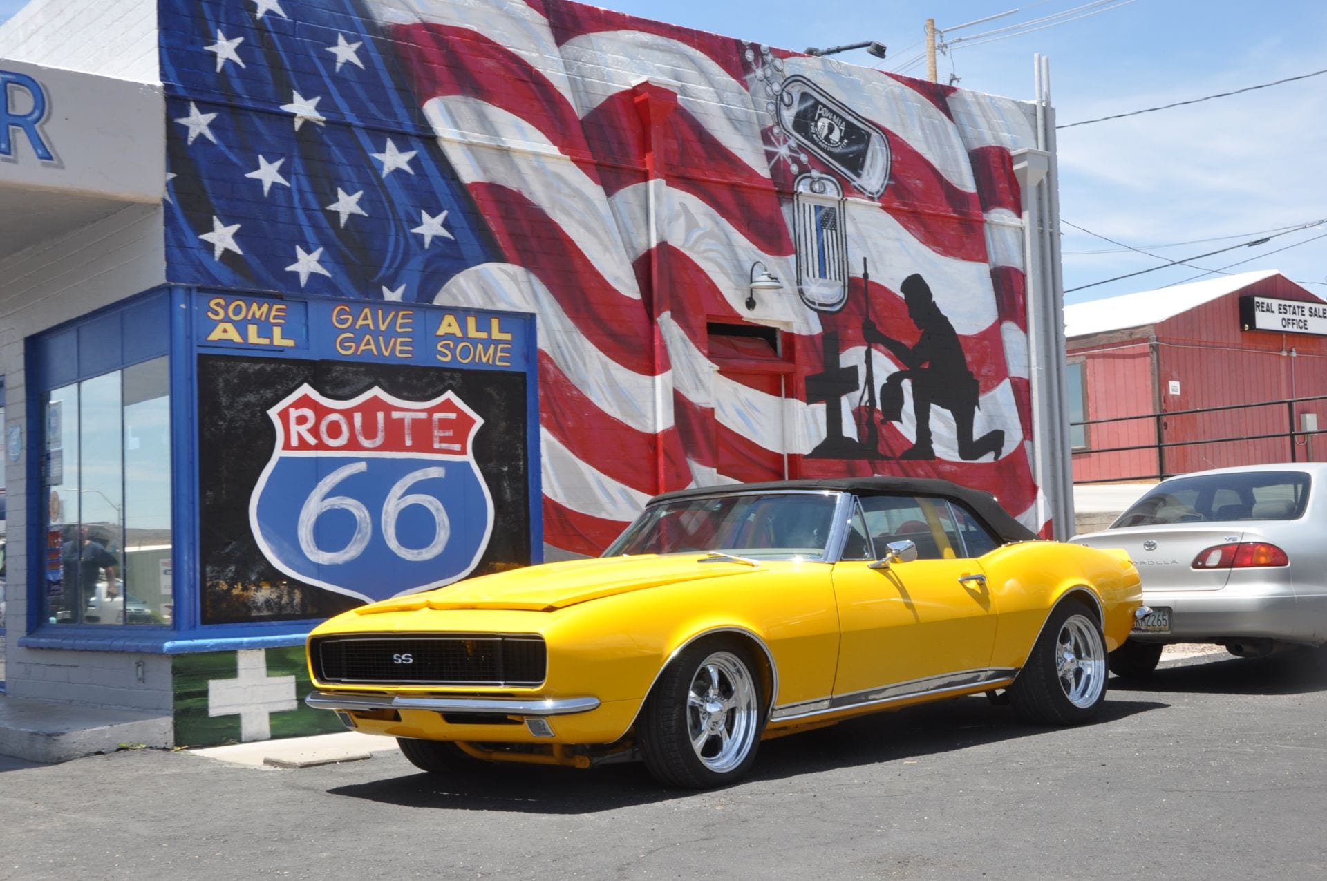 Old Car on Route 66 American Flag